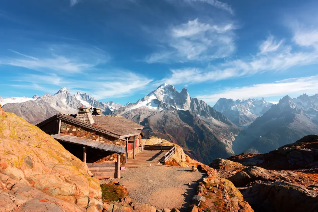 Refuge du Lac Blanc overlooking the Mont Blanc range on a clear autumn day in Chamonix.
