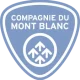 Logo of the Compagnie du Mont-Blanc, featuring a blue triangular shield with white mountain arrows.